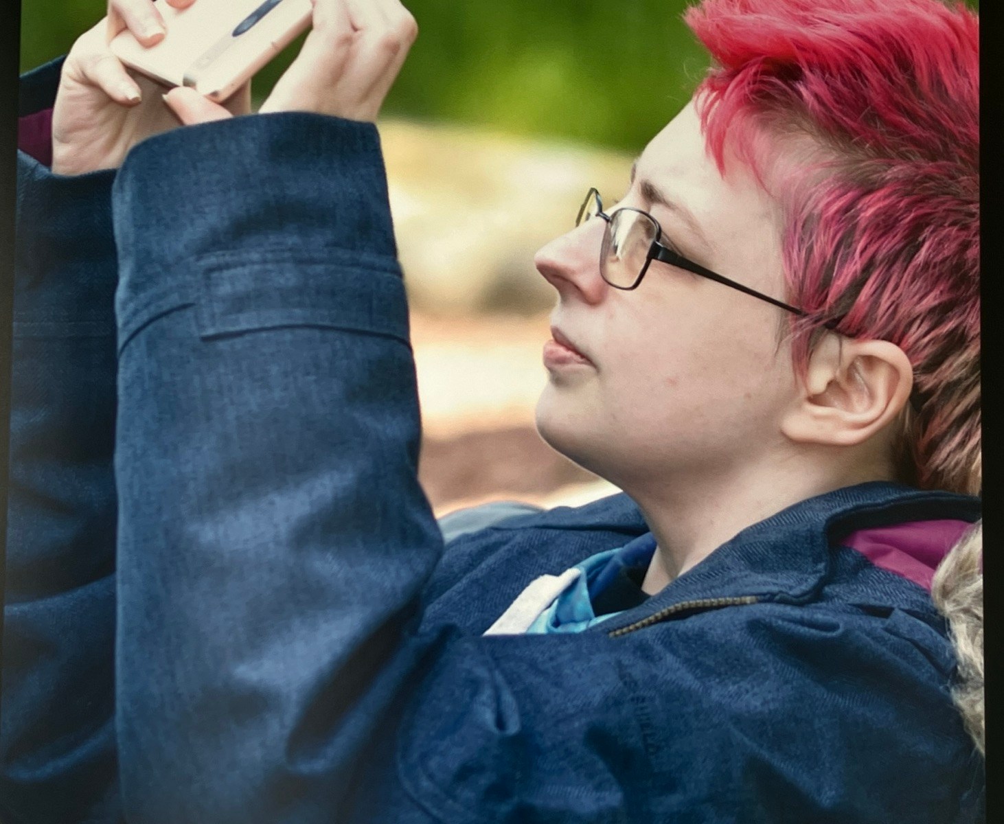 Participant using a mobile phone during a Mindful Photography UK session